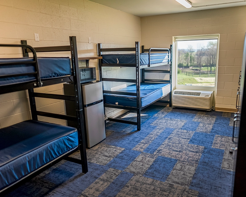Standard bedroom in Compass Commons at Holiday World.
